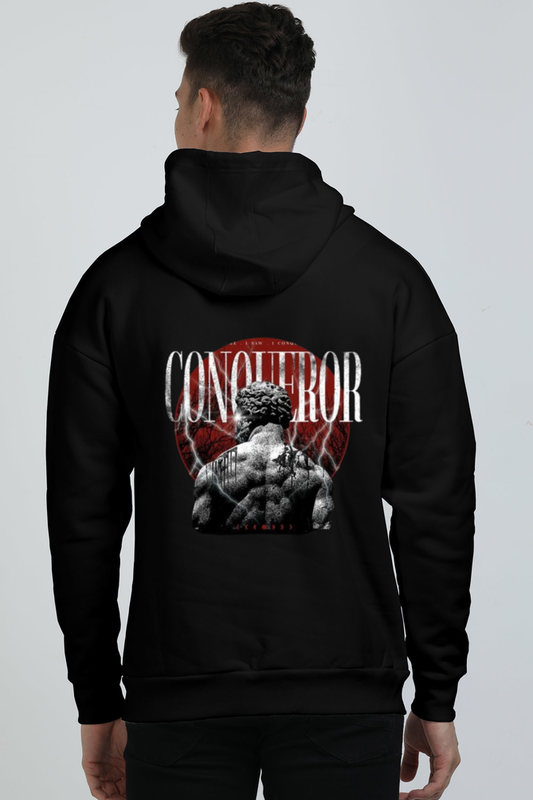 Black unisex hoodie featuring bold ‘Conqueror’ lettering and minimalist warrior graphic, perfect for modern streetwear style