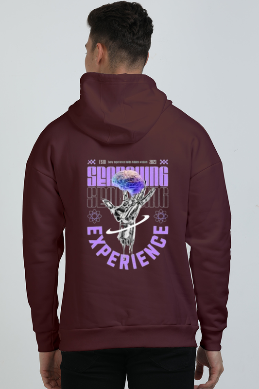 Oversized hoodie with hand and brain graphic symbolizing growth, perfect for trendy streetwear and casual outfits.